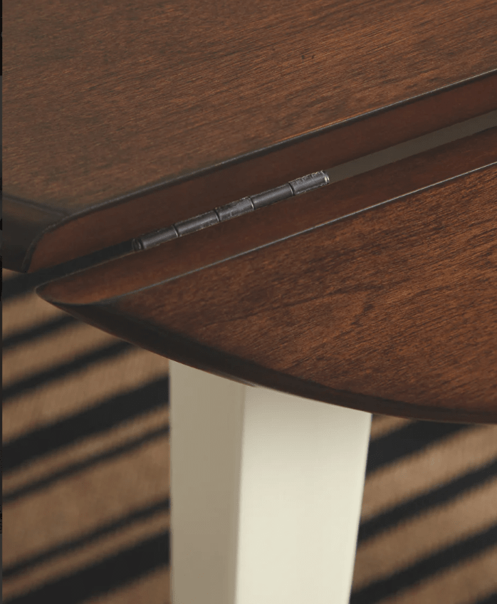 AshleyAshley D335 Woodanville - Round DRM Drop Leaf Table - Cream / Brown