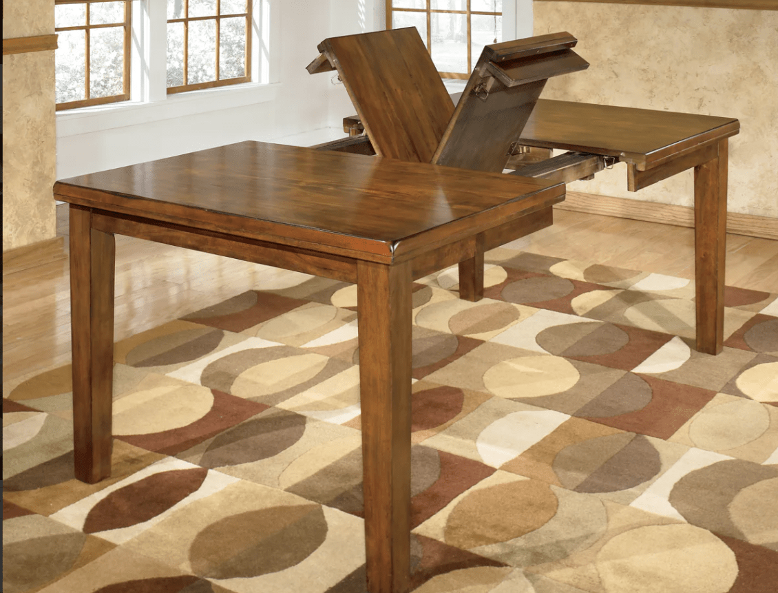 AshleyAshley D594 Ralene - Rectangular Dining Room Butterfly Extension Table - Medium Brown