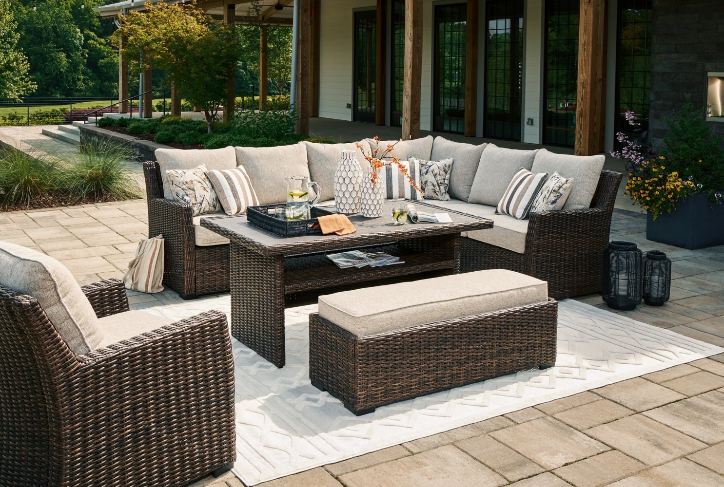 AshleyBrook Ranch Outdoor Sectional Set with Lounge Chair and Coffee Table