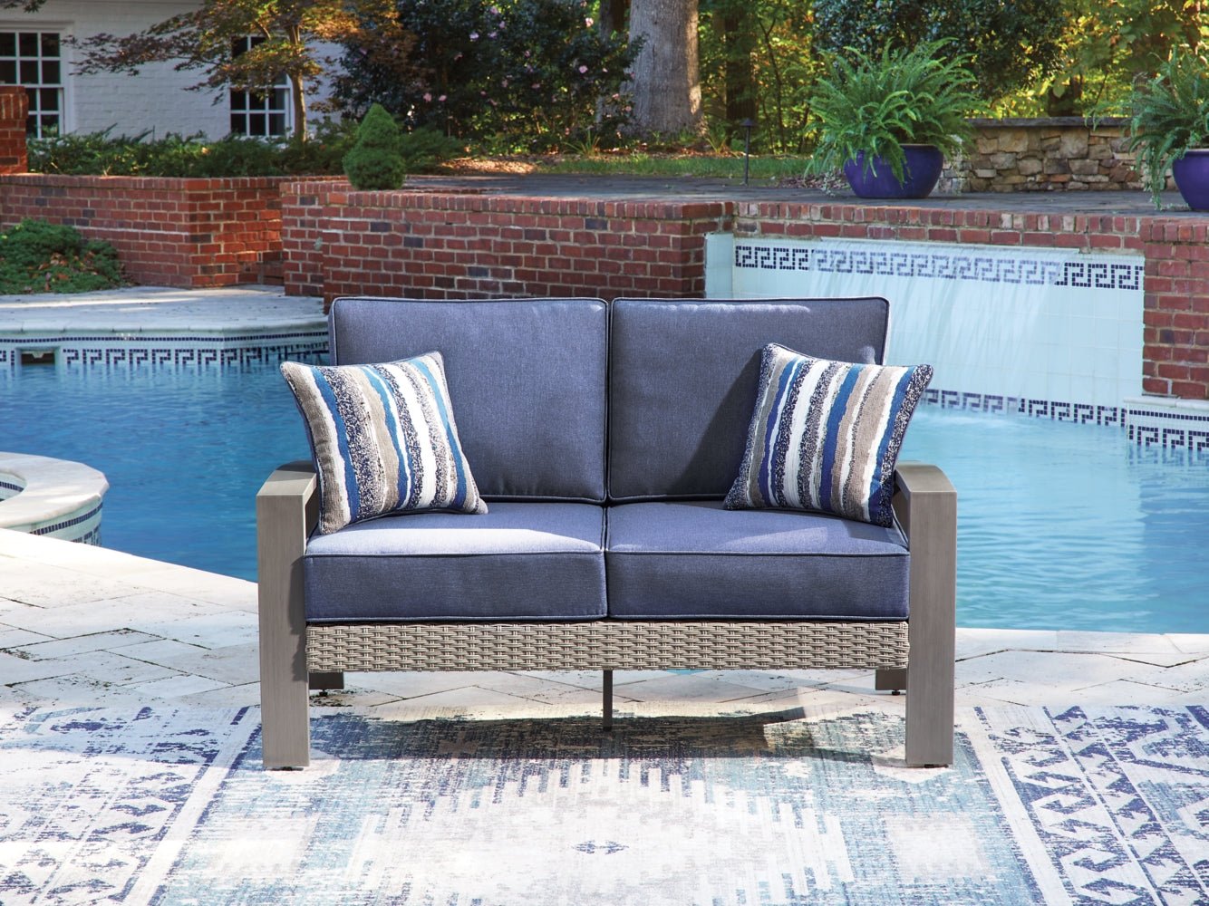 AshleyHalf Moon Beach Outdoor Loveseat with Cushion