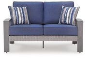 AshleyHalf Moon Beach Outdoor Loveseat with Cushion