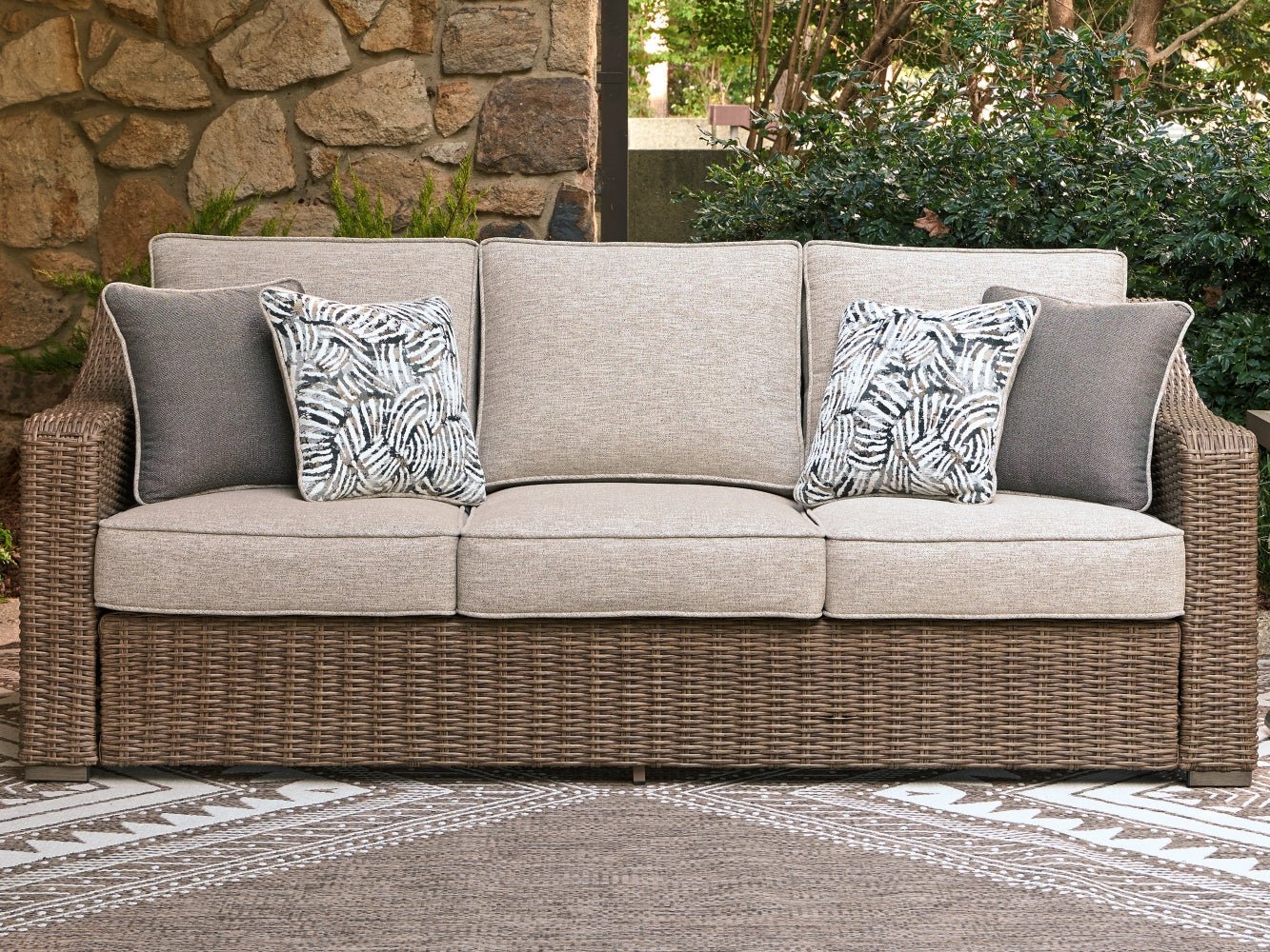 AshleyLaguna Heights Outdoor Sofa with Cushion