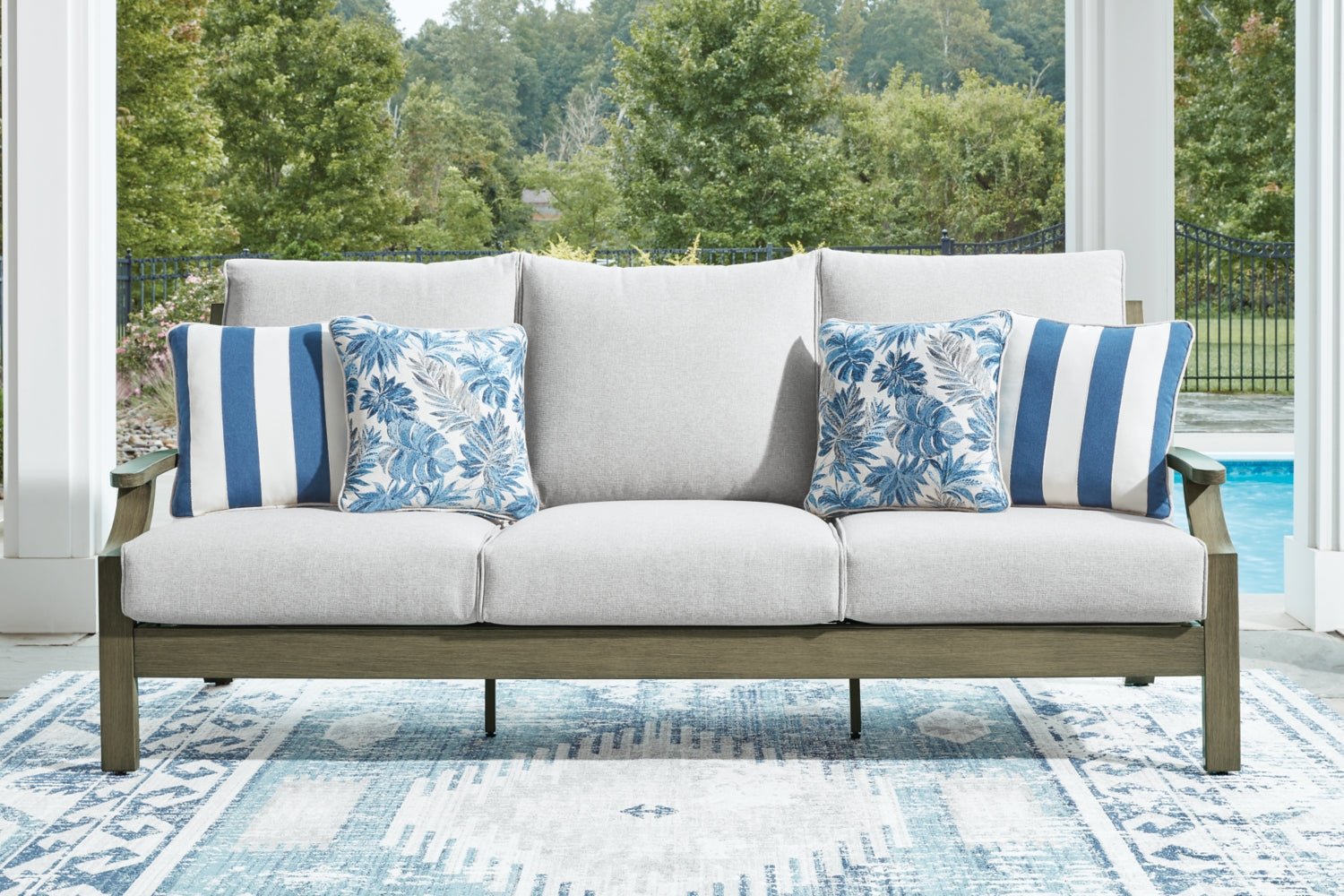 AshleyRainier Ranch Outdoor Sofa and Loveseat with Coffee Table