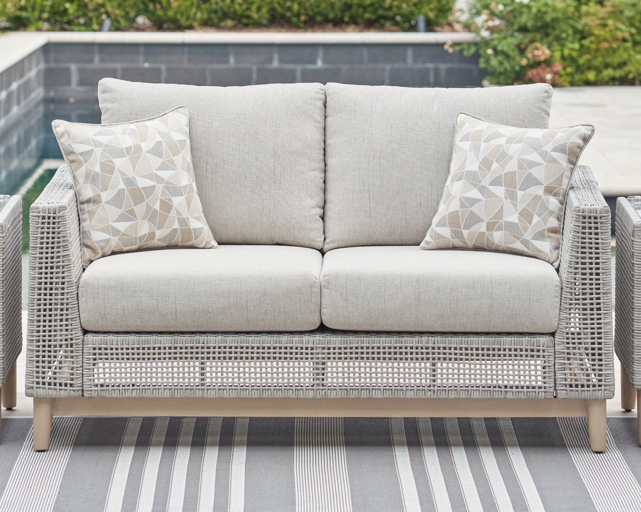 AshleySeton Creek Outdoor Sofa and Loveseat with Coffee Table