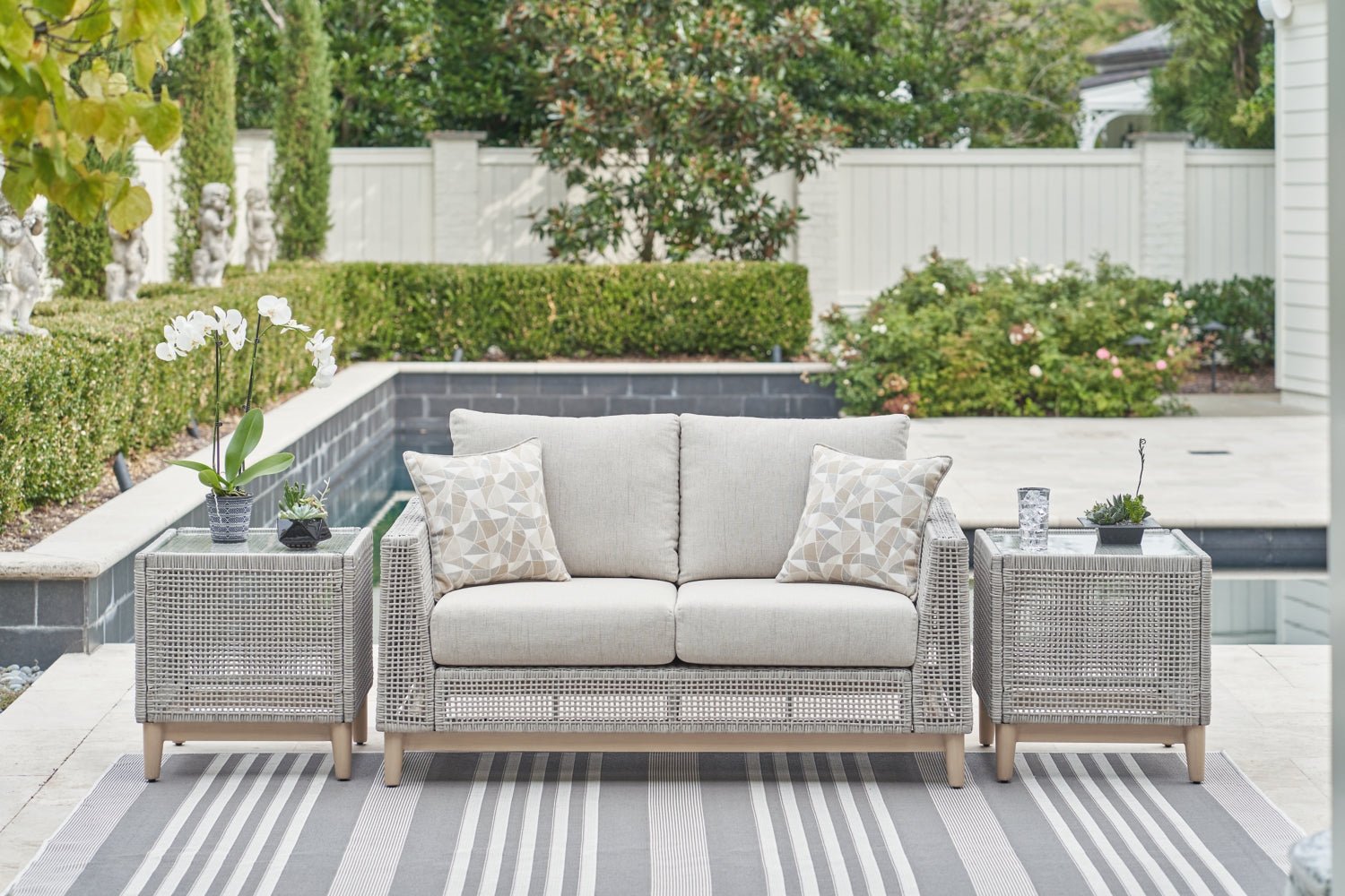 AshleySeton Creek Outdoor Sofa and Loveseat with Coffee Table