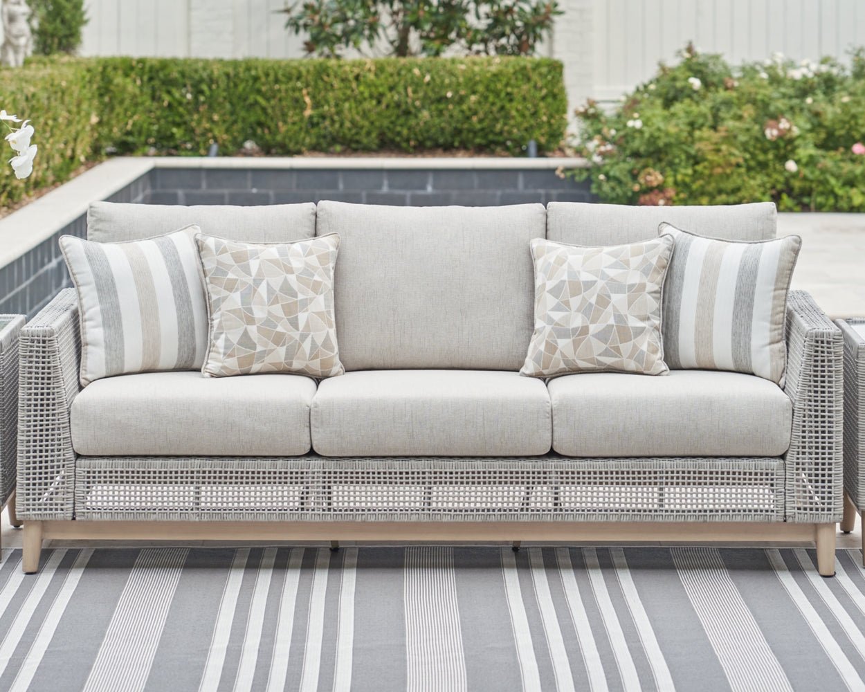 AshleySeton Creek Outdoor Sofa and Loveseat with Coffee Table
