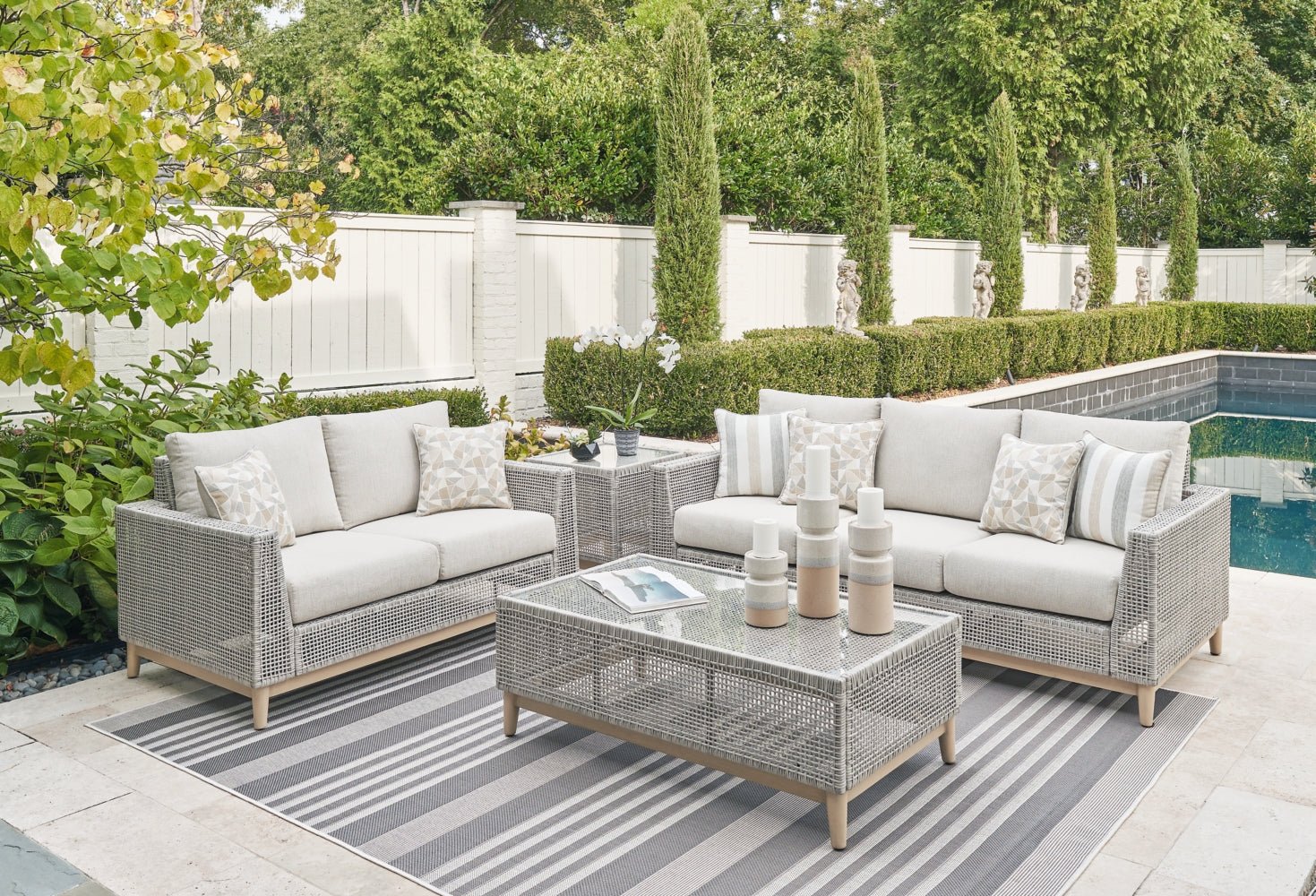 AshleySeton Creek Outdoor Sofa and Loveseat with Coffee Table
